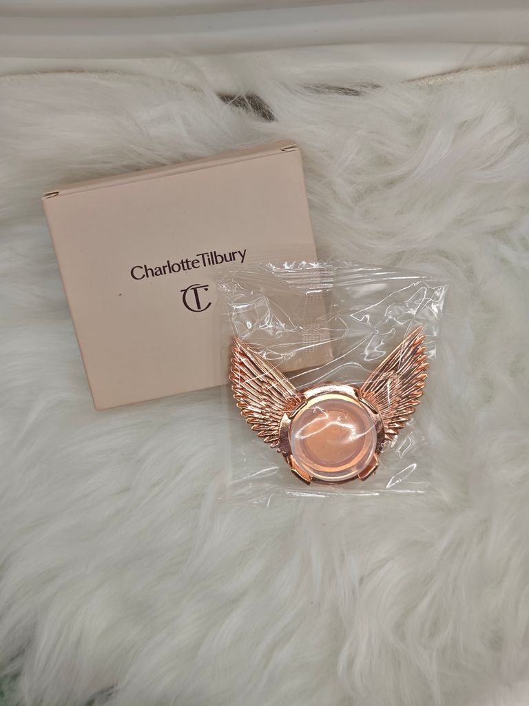Charlotte Tilbury phone grip and mirror charm in rose gold