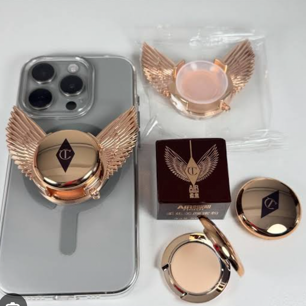 Charlotte Tilbury phone grip and mirror charm in rose gold